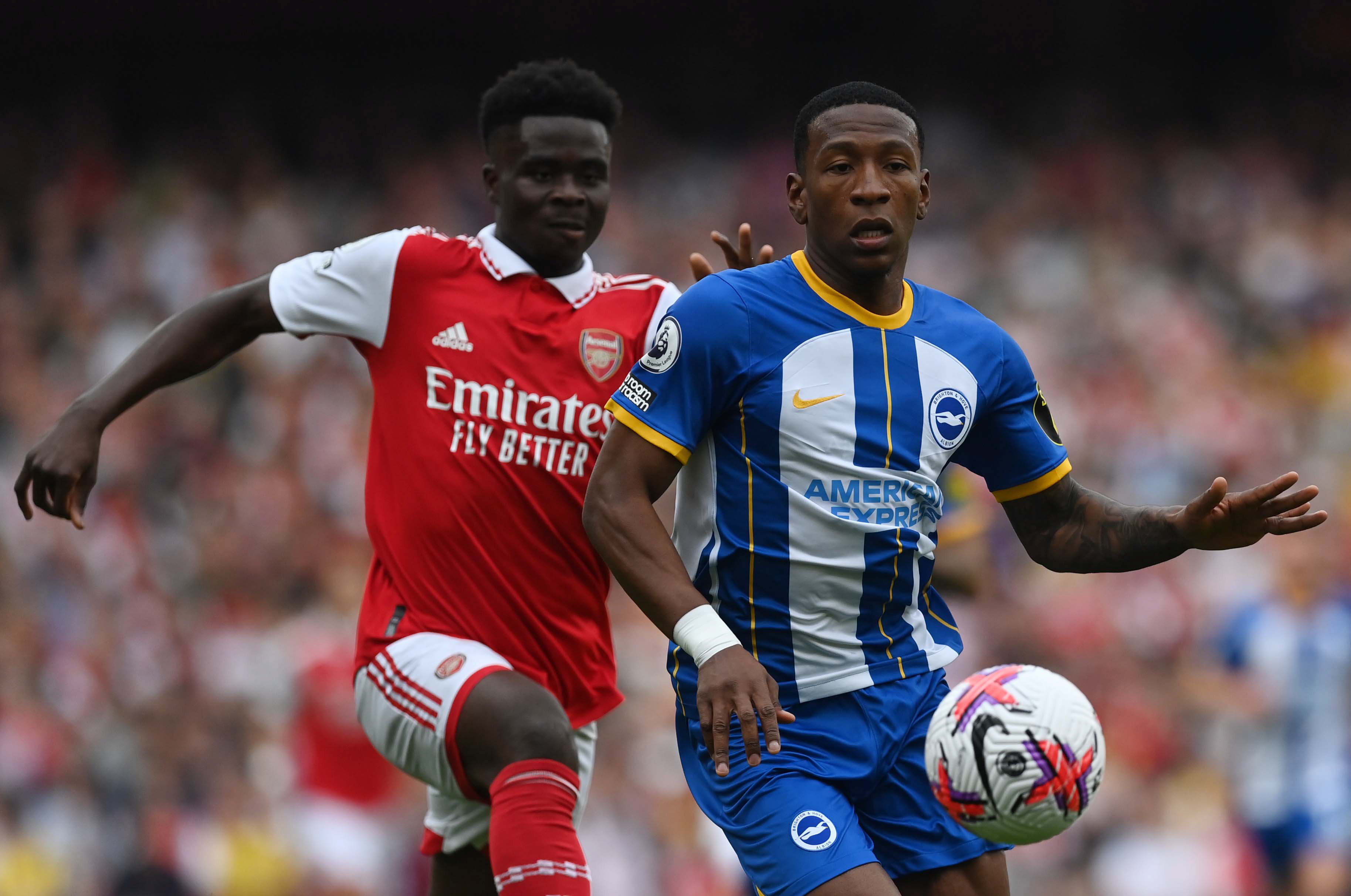 Brighton And Hove's Pervis Estupian (R)
